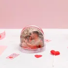 Bola de nieve con corazones