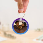 Llavero redondo personalizado con código Spotify, título de la canción y nombre del artista en un lado, y una imagen personalizada en el otro.