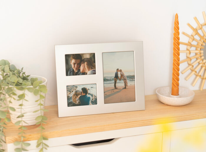 Marco de aluminio para 4 fotos, una en 10x15 y dos en 6x9 cm.