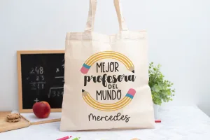 Tote bag personalizada con mensaje 'Mejor profesora del mundo', nombre de la profesora, curso y nombres de los niños en el reverso